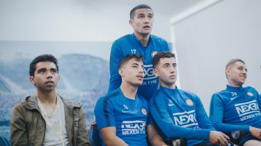 Gamer Marcus Gomes (left) with Melbourne City players Daniel Arzani, Ramy Najarrine and Dylan Pierias