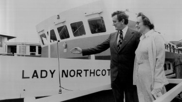 Transport Minister Wal Fife, left, and Elizabeth Nash, daughter of the late NSW Govenor Sir John Northcott, at the christening of the Lady Northcott ferry in 1975. 