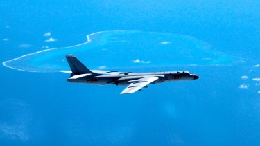 A Chinese H-6K bomber patrols the South China Sea. A dispute over islands and reefs in the area will remain in the background.