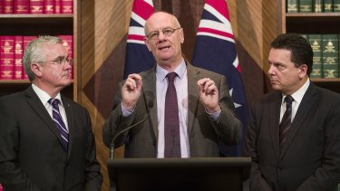 From left, Andrew Wilkie, Reverend Tim Costello of the Alliance for Gambling Reform, and Senator Nick Xenophon.