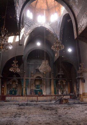 The Armenian St Kevork church in Aleppo after it was burnt during fighting between rebel fighters and Syrian government forces.