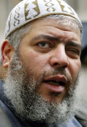 Muslim cleric Abu Hamza al-Masri is escorted from the Central Criminal Courts in this 20 January 2003 file photo. 