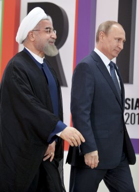 Support: Iranian President Hassan Rouhani (left) with Russian President Vladimir Putin at a summit in Ufa, Russia, on Thursday.