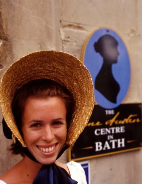 A woman dresses the part at the Jane Austen Centre in Bath.