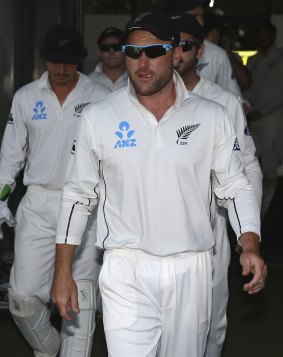Brendon McCullum leads his team out during his final day of Test cricket.
