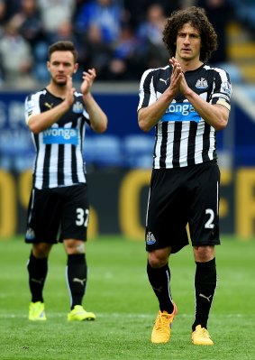 Coloccini, right, denies the team has not been trying.