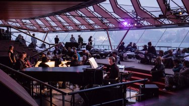 Max Richter, Grace Davidson and ACME perform as day breaks over Sydney Harbour at the end of an eight-hour performance.