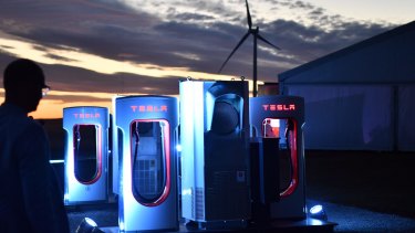 A Tesla car charging station is at the wind and solar battery plant outside of Jamestown, South Australia.