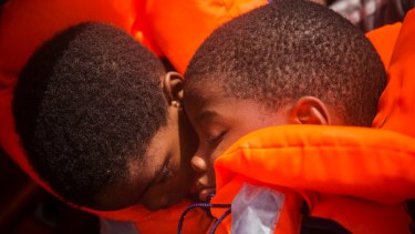 Sub saharan migrants are rescued by aid workers of Spanish NGO Proactiva Open Arms in the Mediterranean Sea, about 15 miles north of Sabratha, Libya in July.