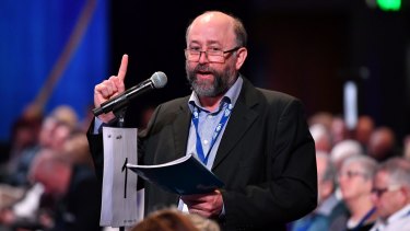 David van Gend debating a resolution at the LNP state convention in Brisbane in July.