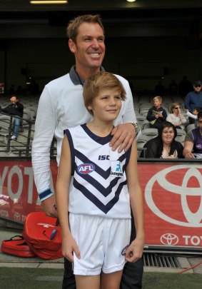 Shane and Jackson Warne in 2011.