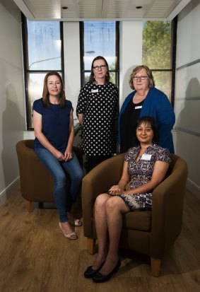 Jaymini Jogia, front, from the Woden Community Service takes part in training to increase safety for women experiencing family and domestic violence. Also pictured are, left, Minister for Women Yvette Berry and WESNET trainers Karen Bentley and Julie Oberin.