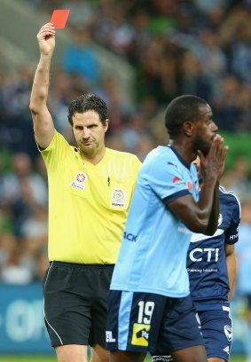 Jacques Faty of Sydney FC is given a red card.