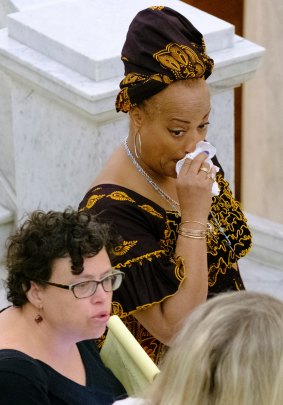 One of Bill Cosby's accusers reacts at the Montgomery County Courthouse after the mistrial was declared.