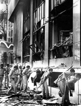 Indian paramilitary officers search for survivors after a massive explosion ripped through the Bombay Stock Exchange in Mumbai in 1993.