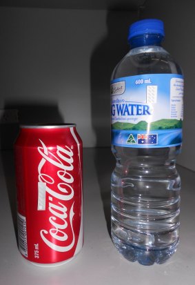 Chipless RFID tags attached to a can of Coke and a bottle of water.