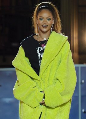 Rihanna accepts her applause at the end of her Fall-Winter 2017/2018 ready-to-wear collection.
