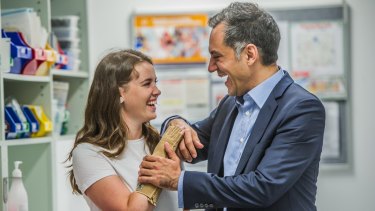 A bond for life: University of Canberra student Sarah Hazell had her right hand re-attached by Canberra Hospital plastic surgeon Dr Ross Farhadieh in what he believes was the procedure of his career.