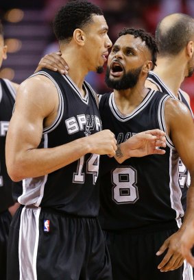San Antonio Spurs guard Patty Mills (right) with guard Danny Green.