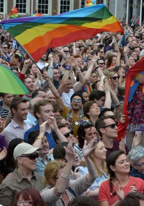 Thousands of people celebrate in Dublin Castle equality referendum is relayed.