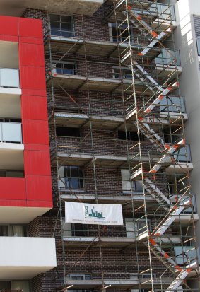 Construction and repair work under way in October 2012 at the West Terrace unit block, Bankstown, where student Connie Zhang died during a fire the previous month.