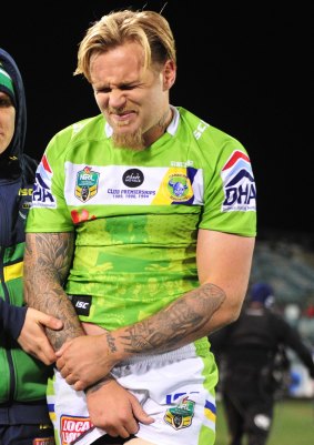 Blake Austin leaves the field on Monday after injuring his shoulder.