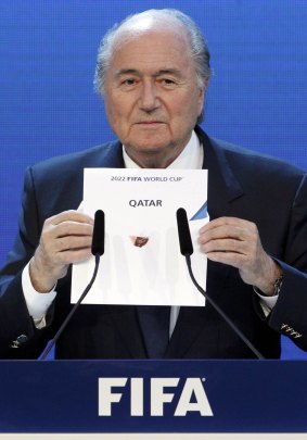 FIFA President Sepp Blatter announces Qatar as the host nation for the FIFA World Cup 2022.