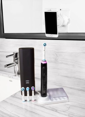 Oral B's new toothbrush pairs up with a smartphone and tells you the weather.