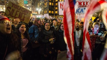 Demonstrators protest Donald Trump's election to the presidency in New York.