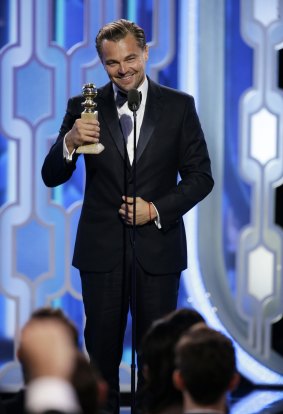 Leonardo DiCaprio accepts the award for best actor in a motion picture drama for his role in The Revenant.