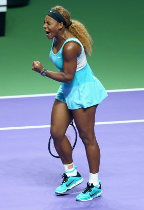 Victorious: Serena Williams celebrates beating Ana Ivanovic.