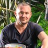 A. Baker head chef Bernd Brademann in the restaurant's garden in New Acton.