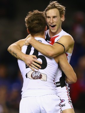 Up: Jack Billings
and Jimmy Webster
of the Saints
celebrate after the
Saints defeated the
Bulldogs in round 6.