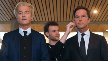 Dutch Prime Minister Mark Rutte, right, and right-wing populist leader Geert Wilders.