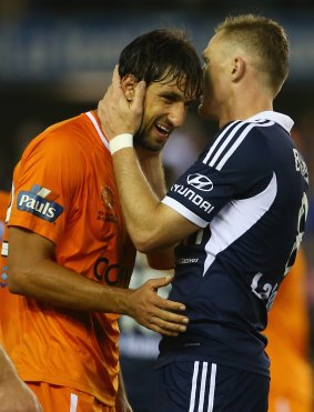 Former teammates Thomas Broich and Besart Berisha catch up after Friday night's game. 