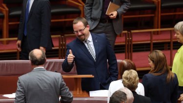 Senator Ricky Muir gives the thumbs up to Senate Leader Eric Abetz after he made his inaugural speech on Thursday.