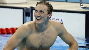 Winner: Australia's Mack Horton smiles after taking out gold in the final of the men's 400m freestyle.