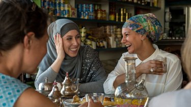 Amina Sadikay and Hebba El Masri at the Moroccan Deli-cacy cafe, taking part in Speed Date a Muslim which is to become a regular event. Anyone can come along and ask a Muslim woman questions about their religion and  culture. 