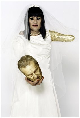 Mike Parr, Best Man 11 April 2006, colour photograph from closed performance, The Lab Studio, Waterloo, Sydney. 
Private Collection. Performer: Mike Parr. 
Photographer: Paul Green. Digital manipulation: Felicity Jenkins; Make-up: Chizuko Saito. 