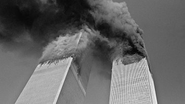 Smoke billows from the twin towers of the World Trade Center on September 11, 2001.