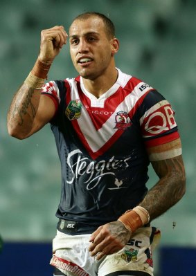 Dominant: Blake Ferguson celebrates scoring a try for the Roosters during the round nine NRL match against the Knights at Allianz Stadium.