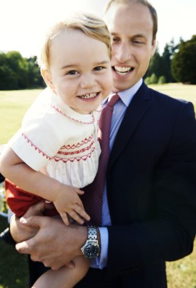 Prince George plays with his father, Prince William, in a 2015 photograph released to mark his second birthday.