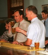 Wayne Goss and former Prime Minister Paul Keating have a beer at a Charleville pub in 1994.