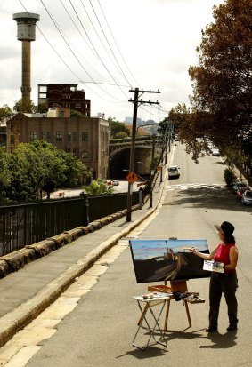 Capturing history: artist Jane Bennett paints the scene in March. 