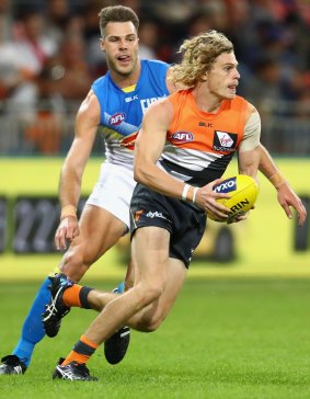Fortunate: Giants defender Adam Kennedy is determined to retain his place in the team.