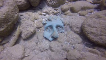 A rare Roman bronze statue preserved in sand for 1600 years. 