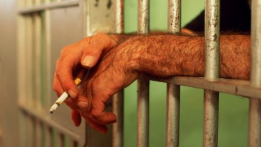 Prisoners who smoke are being forced to quit, while resident officers will have designated smoking areas.
