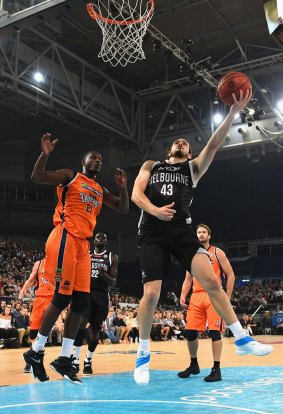 Melbourne United's Chris Goulding shoots during the round seven match against the Cairns Taipans.