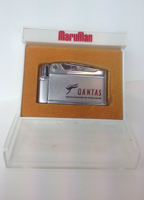 A Qantas cigarette lighter. Estimated value $100.
