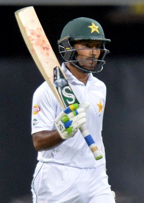 Asad Shafiq celebrates scoring a half century in the second innings.
